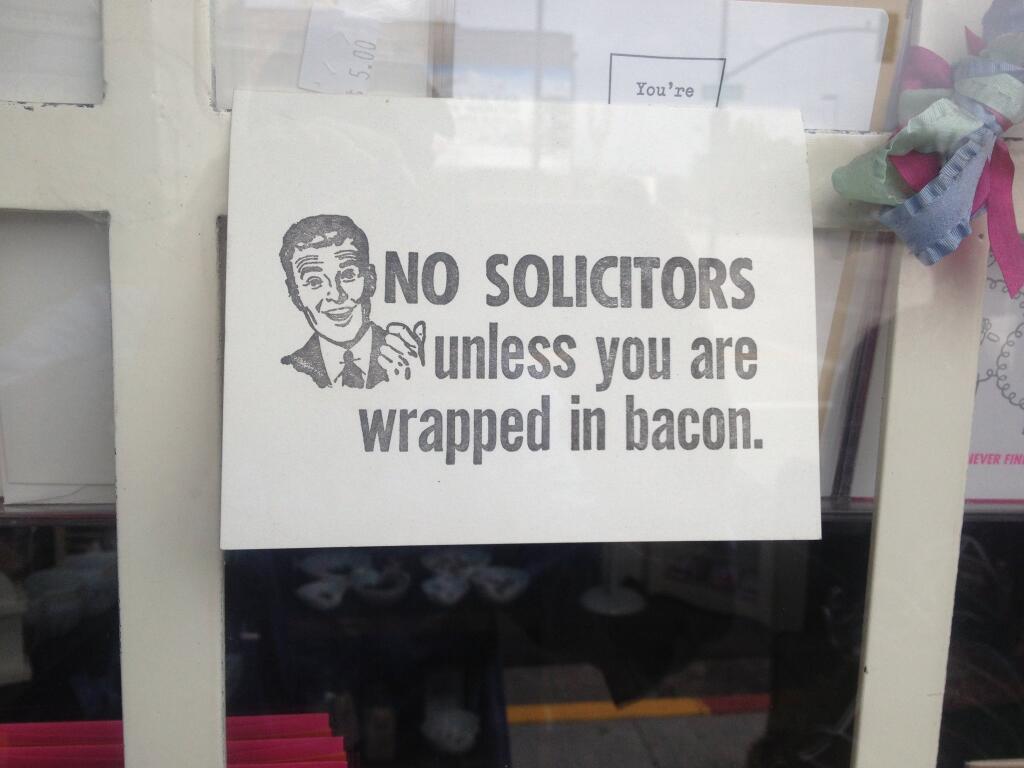 NO SOLICITORS unless you are wrapped in bacon.