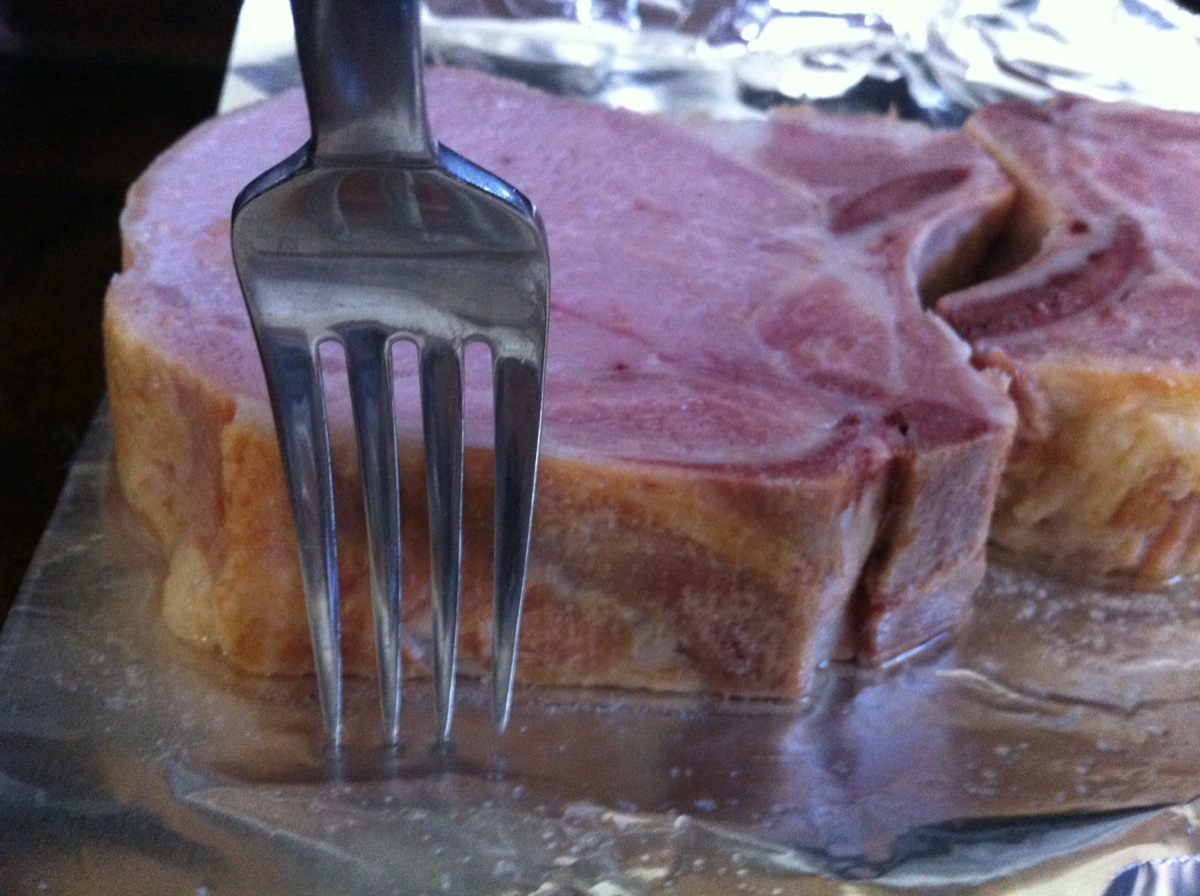 Just Good Meat Smoked Pork Chop compared to a regular fork